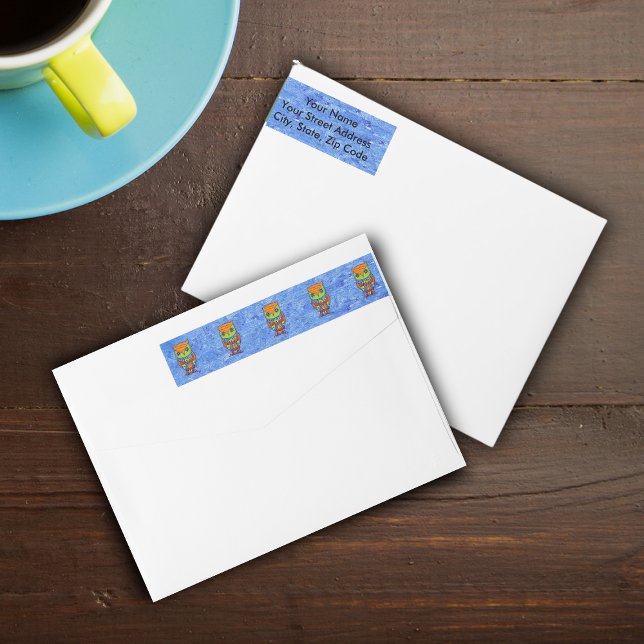 Whimsical Colourful Fantasy Owl Wrap Around Label (Rows of abstract fantasy owls in orange, green and red on blue wrap around return address labels.)