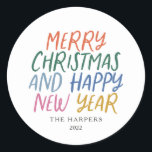 Whimsical Colourful Merry Christmas Happy New Year Classic Round Sticker<br><div class="desc">Elevate your holiday stationery,  crafts of gift wrap with these personalized stylish holiday stickers.  Featuring whimsical styled typography in bright colours.</div>