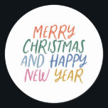 Whimsical Colourful Merry Christmas Happy New Year Classic Round Sticker<br><div class="desc">Featuring whimsical styled typography in bright colours.</div>