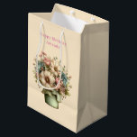 Whimsical Flowers in a Planter Pot Cute Birthday Medium Gift Bag<br><div class="desc">Gift bag with a cute image. Blue. pink and cream colored flowers with green leaves. Set inside a green flower pot with a green plaid cloth hanging over the side.</div>