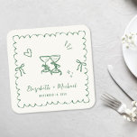 Whimsical Green Wavy Frame Cream Wedding Square Paper Coaster<br><div class="desc">Romantic light cream coasters for your engagement party,  rehearsal dinner,  wedding reception,  party favors,  etc.,  featuring a green wavy frame adorned with coquette bows,  whimsical hand drawn illustrations of a heart,  stars and wine glasses,  and the names of the bride and groom in a playful green script.</div>