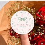 Whimsical Hand Drawn Fun French Christmas Party Classic Round Sticker<br><div class="desc">Add a playful touch to your holiday celebration with these whimsical hand-drawn French Christmas party stickers. Featuring quirky doodles in festive pink, red, and green, and a charming vintage coquette aesthetic, they’re perfect for sealing envelopes, decorating gifts, or personalizing party favours. With editable text, these customizable stickers bring fun, style,...</div>