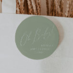 Whimsical Sage Green Oh Baby 2 Inch Round Button<br><div class="desc">Introducing our whimsical sage green oh baby button, perfect for your simple modern boho celebration any season of the year! This button has a boho-chic, gender-neutral vibe with elegant calligraphy and a delicate minimalist design, making it ideal for both girls and boys. Plus, it's editable, so you can add your...</div>