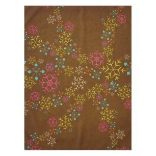 Whimsical Snowflakes on Brown Tablecloth