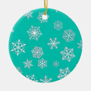 White 3-d snowflakes on a turquoise background ceramic ornament