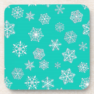 White 3-d snowflakes on a turquoise background coaster