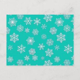 White 3-d snowflakes on a turquoise background postcard
