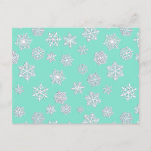 White 3-d snowflakes on an aqua background postcard