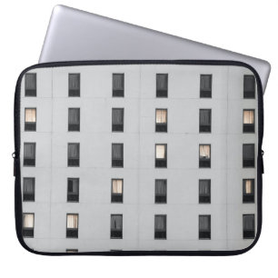 White and black concrete building laptop sleeve