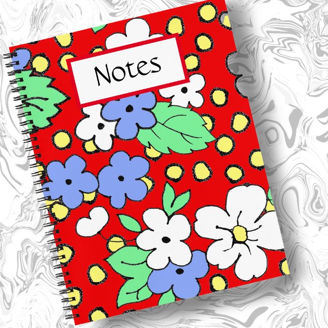 White and blue flowers on red spiral notebook (Creator Uploaded)