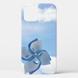 White and blue handheld windmill under cloudy skie iPhone 12 case