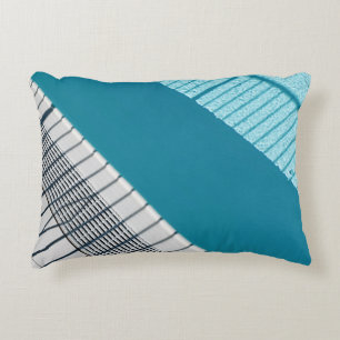 White and blue striped textile accent pillow