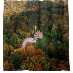WHITE AND BROWN HOUSE SURROUNDED BY TREES