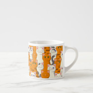 White and ginger cats pattern green eyes blue eyes espresso cup