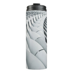 White and grey building structure thermal tumbler