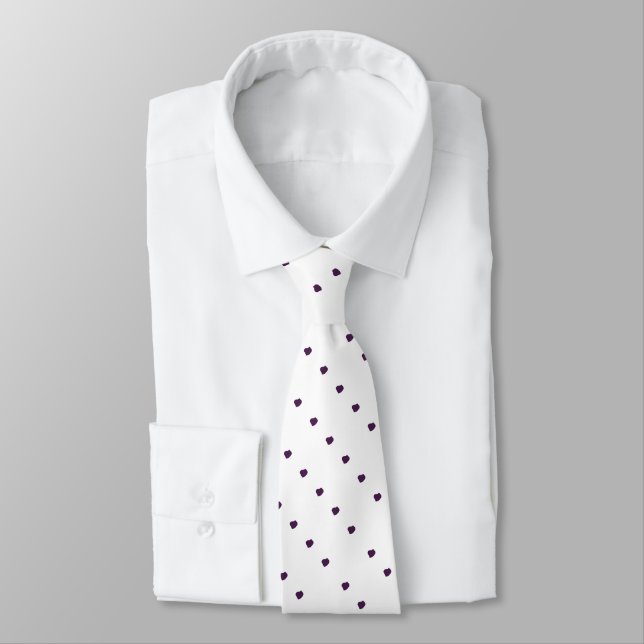 white background with diagonal rows of black spots tie (Tied)