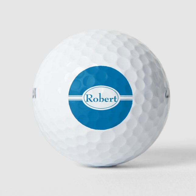 White band and oval blue name golf balls (Front)