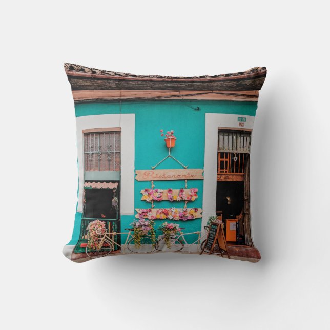 WHITE BICYCLE PARKED BESIDE TEAL PAINTED CONCRETE  THROW PILLOW (Front)