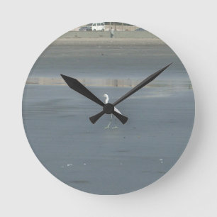 White Bird on Grey Sand Beach Art Print Round Clock