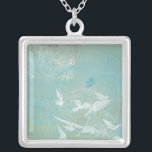 White Birds Flying Through Blue Sky Silver Plated Necklace<br><div class="desc">Megan Meagher created this print of white birds flying through a blue sky. A peaceful picture,  the white of the birds and the blue of the background blend together very well. Order yours now!</div>