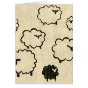 White & Black Sheep on Cream Background