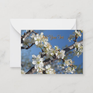 White blooming plum tree branch in spring custom card
