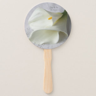 White calla lilies on linen hand fan