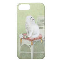 white cat and roses on elegant chair pillow