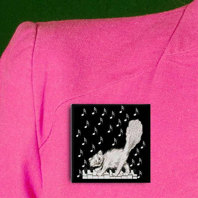 White Cat on Piano Keys 2 Inch Square Button (Happy winking white cat on piano keys music notes on black square pin back button.)