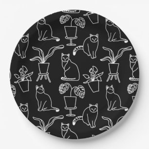 White cats on black paper plate