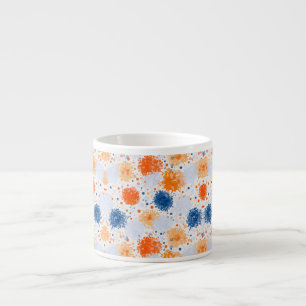 White ceramic mug featuring an abstract pattern 