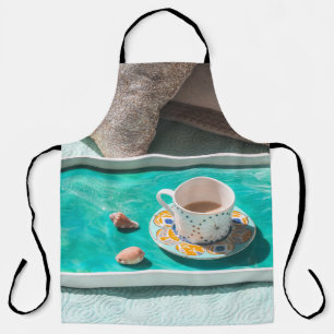 White ceramic mug on white serving tray apron