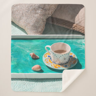 White ceramic mug on white serving tray sherpa blanket