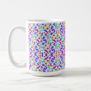 White ceramic mug with vibrant colourful paisley