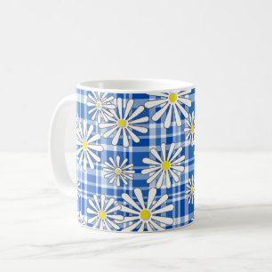 White chamomile flowers on a blue chequered backgr coffee mug
