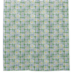 White chamomile flowers on a green blue chequered