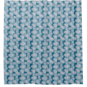 White chamomile flowers on striped blue background
