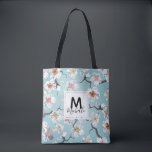White Cherry Blossom Colourful Monogram Tote Bag<br><div class="desc">A elegent bright floral design with white cherry blossom flowers. You can personalize this design with your name and initial to give it a special touch.
Please contact me for help finding matching items.</div>