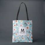 White Cherry Blossom Colourful Monogram Tote Bag<br><div class="desc">A elegent bright floral design with white cherry blossom flowers. You can personalize this design with your name and initial to give it a special touch.
Please contact me for help finding matching items.</div>