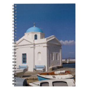 White church on the beach near the Aegean Sea on Notebook