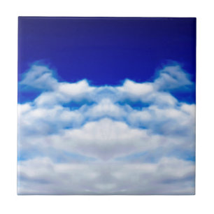 White cloud face against a blue sky tile
