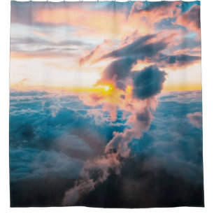 WHITE CLOUDS UNDER ORANGE SKY