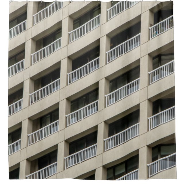 White concrete building during daytime (Front)