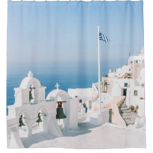 White concrete building near body of water in the
