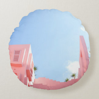White concrete building round pillow