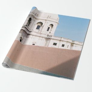 WHITE CONCRETE BUILDING UNDER BLUE SKY WRAPPING PAPER