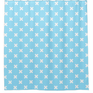 White cross stitches on baby blue