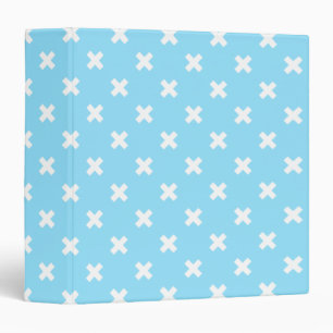 White cross stitches on baby blue binder