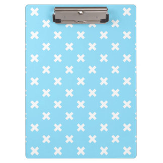 White cross stitches on baby blue clipboard