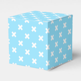 White cross stitches on baby blue favor box